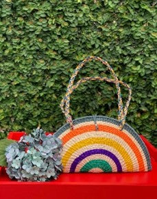Beautiful half-moon multicolor purse crafted with toquilla straw