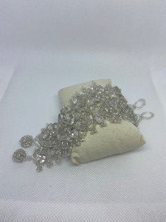 Hand-made bracelet weaved with chaquiras and white quartz stones