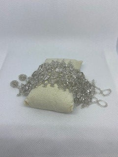 Hand-made bracelet weaved with chaquiras and white quartz stones