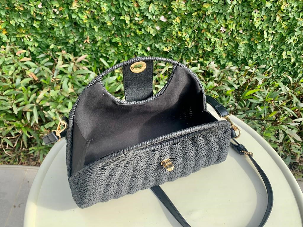 Black small purse made from rice fibers