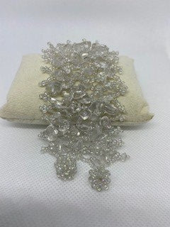 Hand-made bracelet weaved with chaquiras and white quartz stones