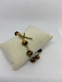 Beautiful bracelet with a little cross.