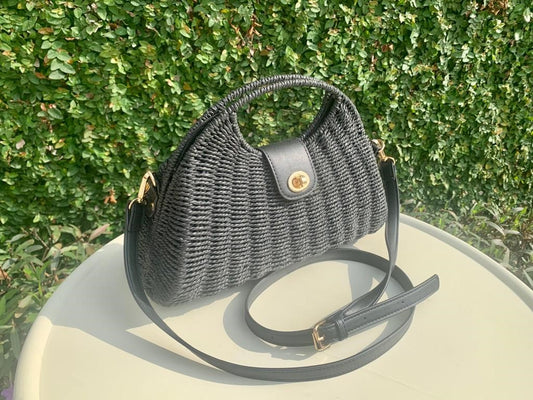 Black small purse made from rice fibers